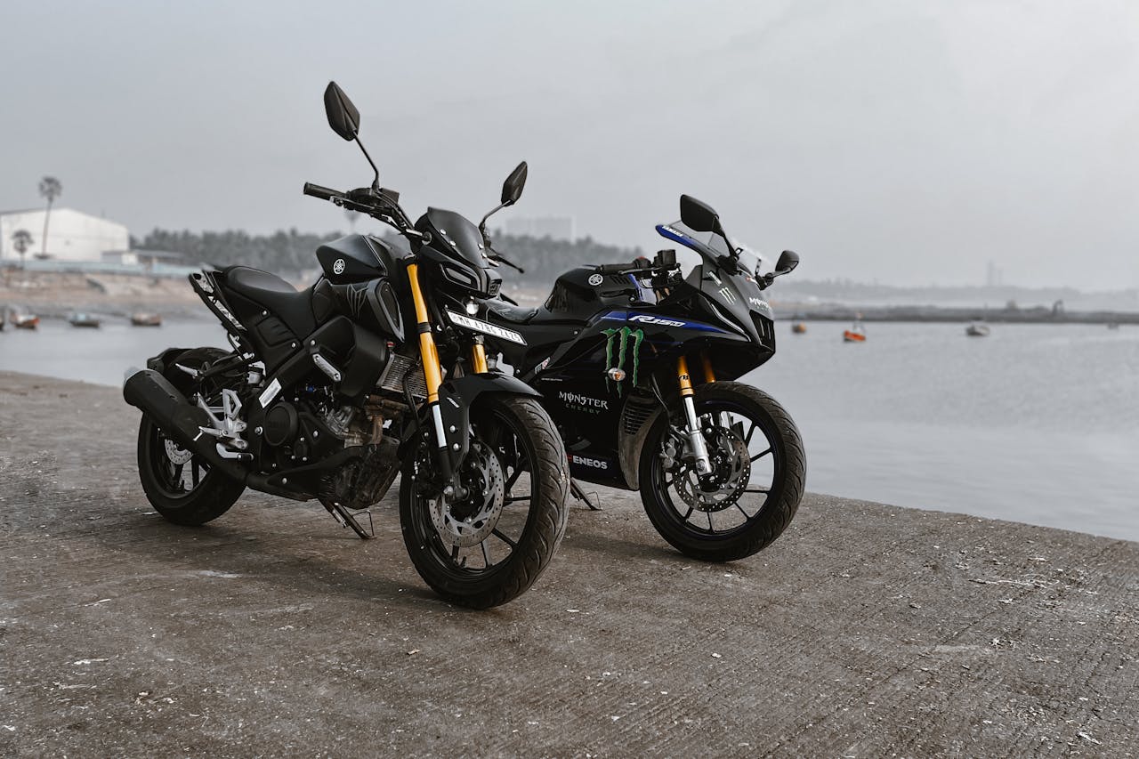 Black Motorcycles Parked on the Seawall