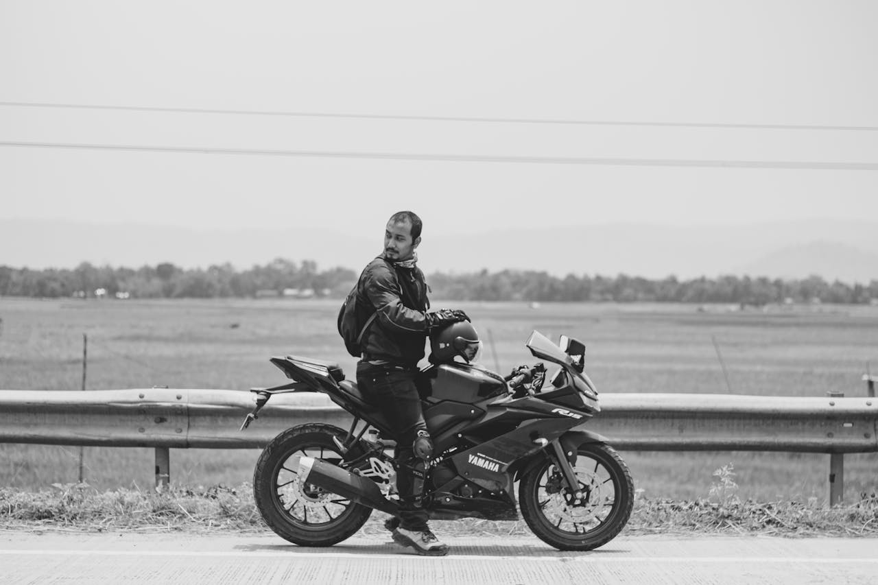 Man with Mustache Sitting on Yamaha Motorcycle